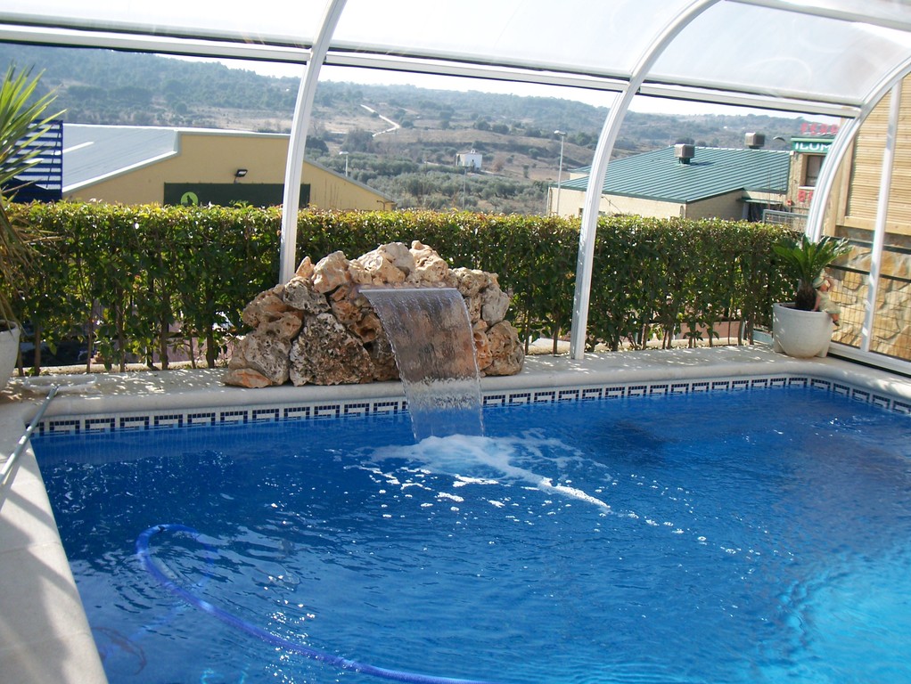 Luxury spa pool with integrated seating and modern water circulation system.